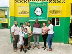 corporate-hands-|-vm-foundation-donates-all-in-one-computer-to-spalding-primary