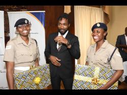 corporate-hands-|-mc-systems-donates-laptops-to-shesecures-jamaica-participants