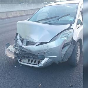 auckland-woman’s-car-written-off-after-she-swerves-to-avoid-hay-bale-on-northwestern-motorway