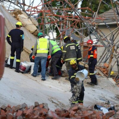 building-collapse-in-south-africa-leaves-4-dead,-dozens-trapped