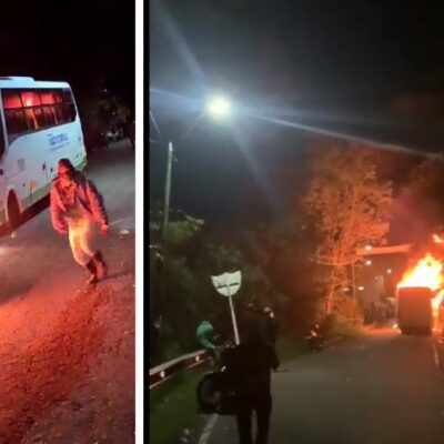 manifestantes-que-bloquean-la-via-medellin-–-uraba-quemaron-un-bus-en-buritica