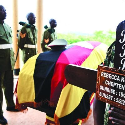 slain-olympian-buried-with-full-military-honours